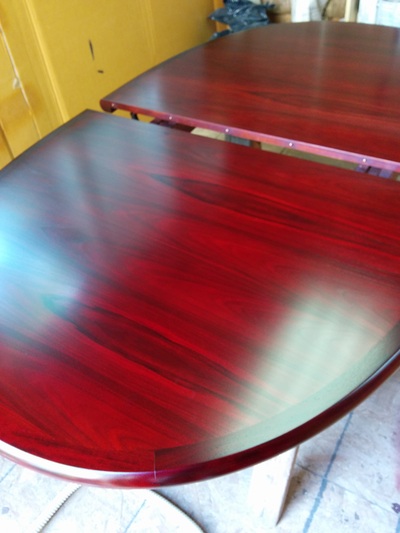 Danish Rosewood  table after refinishing at Teakfinder. Eco friendly furniture refinishing, restoration and upholstery.